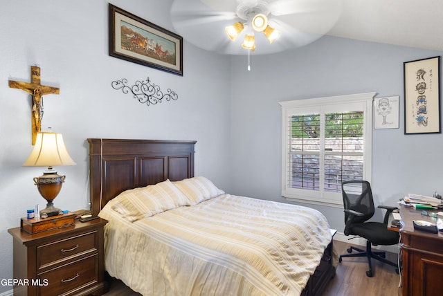 bedroom featuring wood-type flooring, lofted ceiling, and ceiling fan