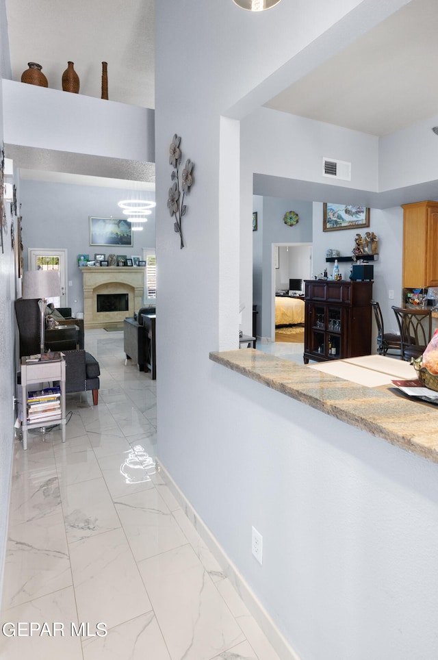 kitchen with a chandelier