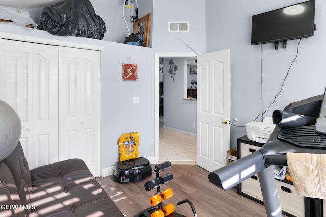 exercise area with hardwood / wood-style floors