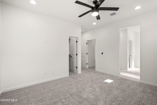 unfurnished bedroom with light carpet and ceiling fan