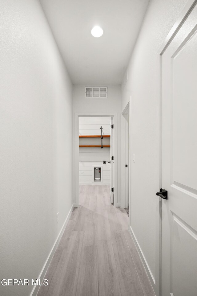 hallway featuring light hardwood / wood-style floors