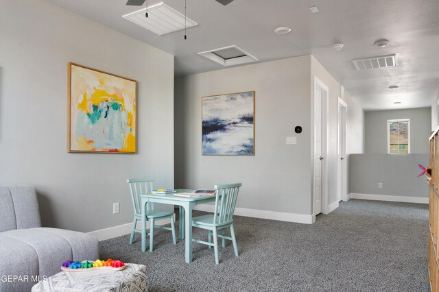 dining area featuring carpet flooring