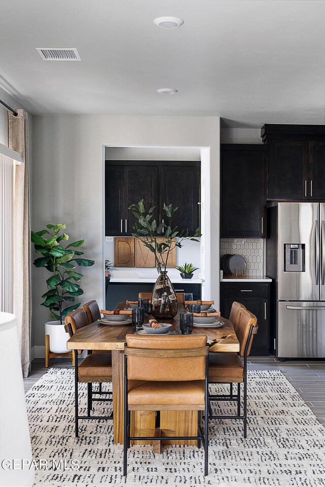 dining area with light hardwood / wood-style flooring