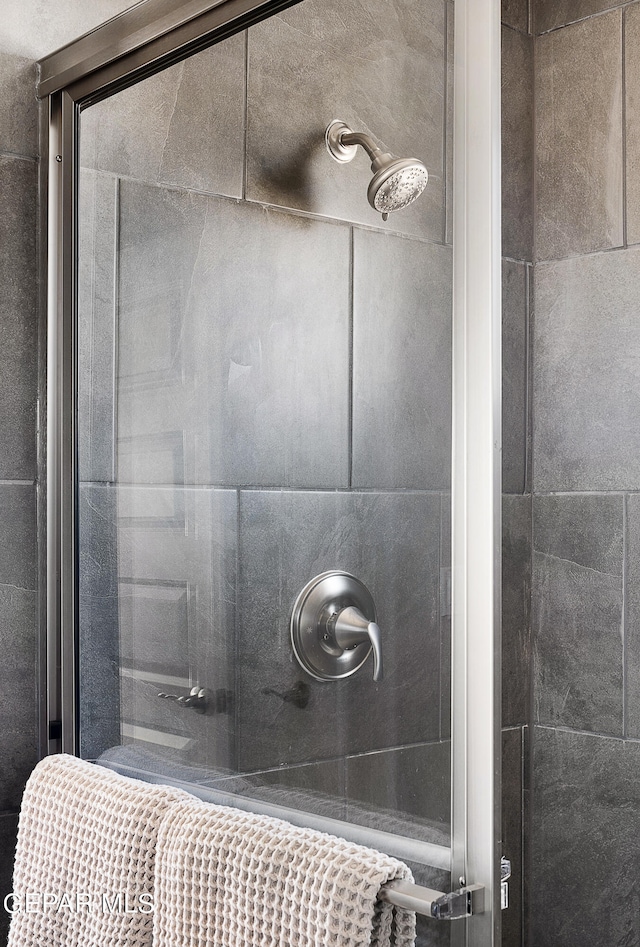 bathroom with an enclosed shower