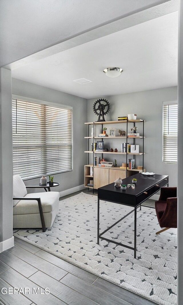 recreation room featuring hardwood / wood-style flooring