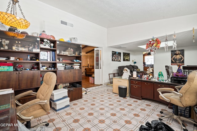 office area featuring a textured ceiling