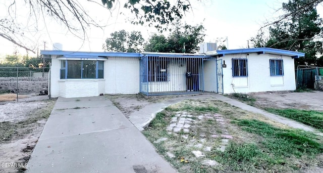 view of front of house with central air condition unit