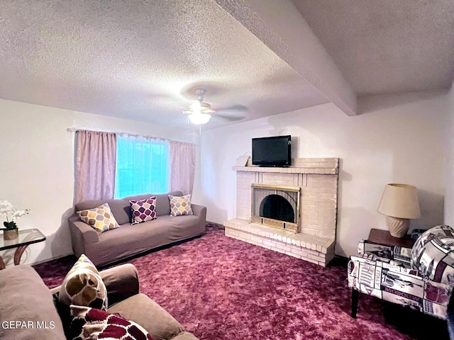 living room with ceiling fan, a fireplace, beam ceiling, and carpet