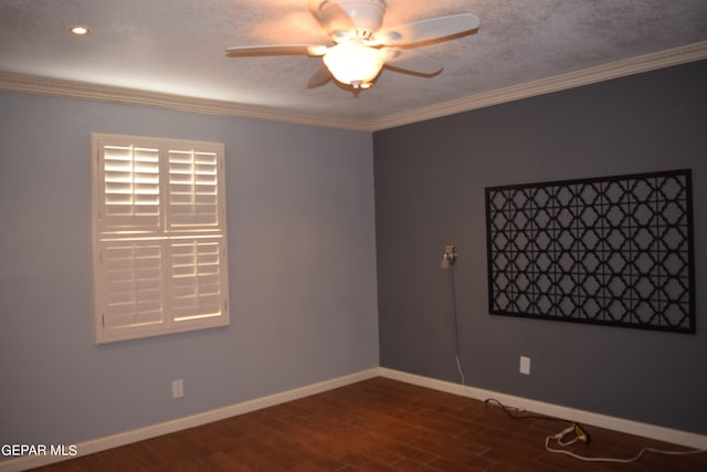 spare room with a textured ceiling, wood-type flooring, ornamental molding, and ceiling fan