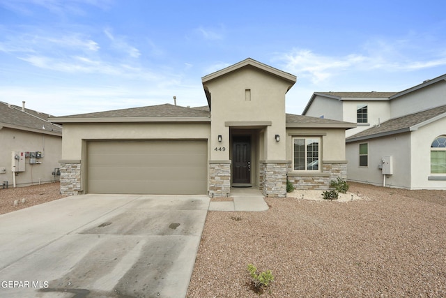 view of front of property with a garage