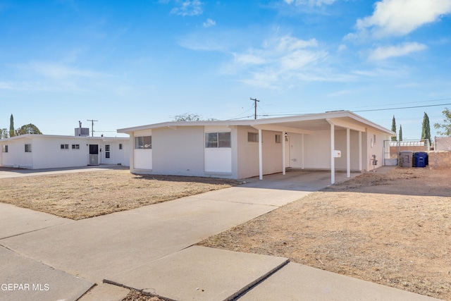 view of front of house featuring a carport