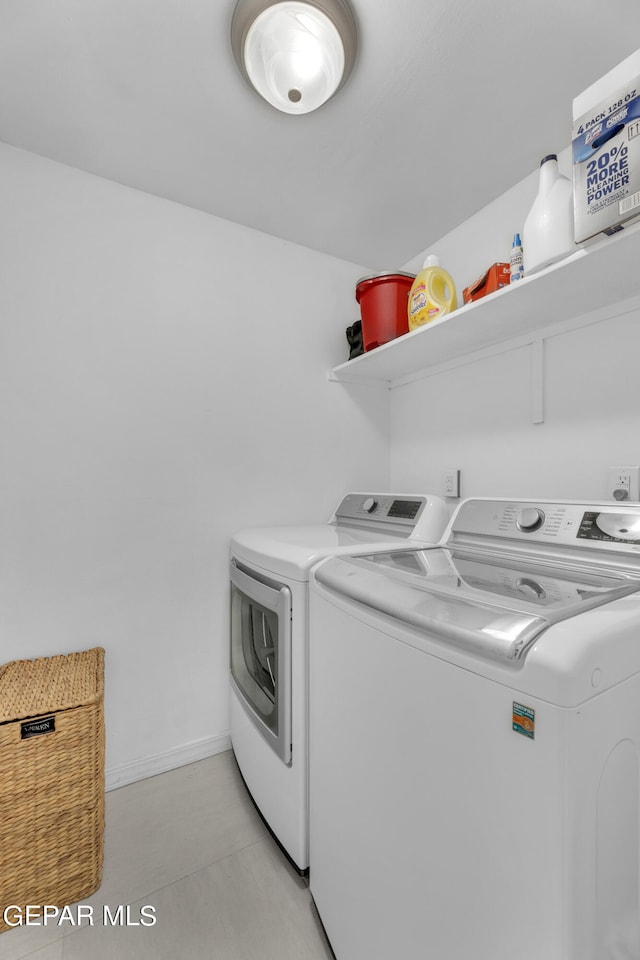 laundry area with washer and dryer