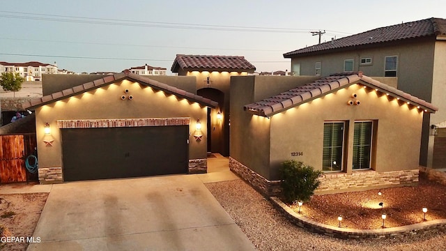 view of front of property featuring a garage