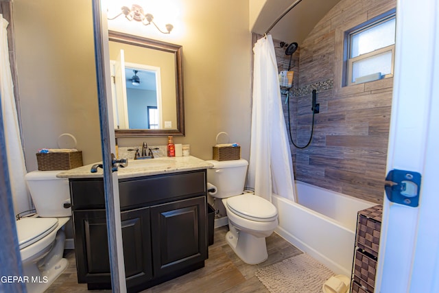 full bathroom with shower / bath combo, hardwood / wood-style flooring, vaulted ceiling, vanity, and toilet