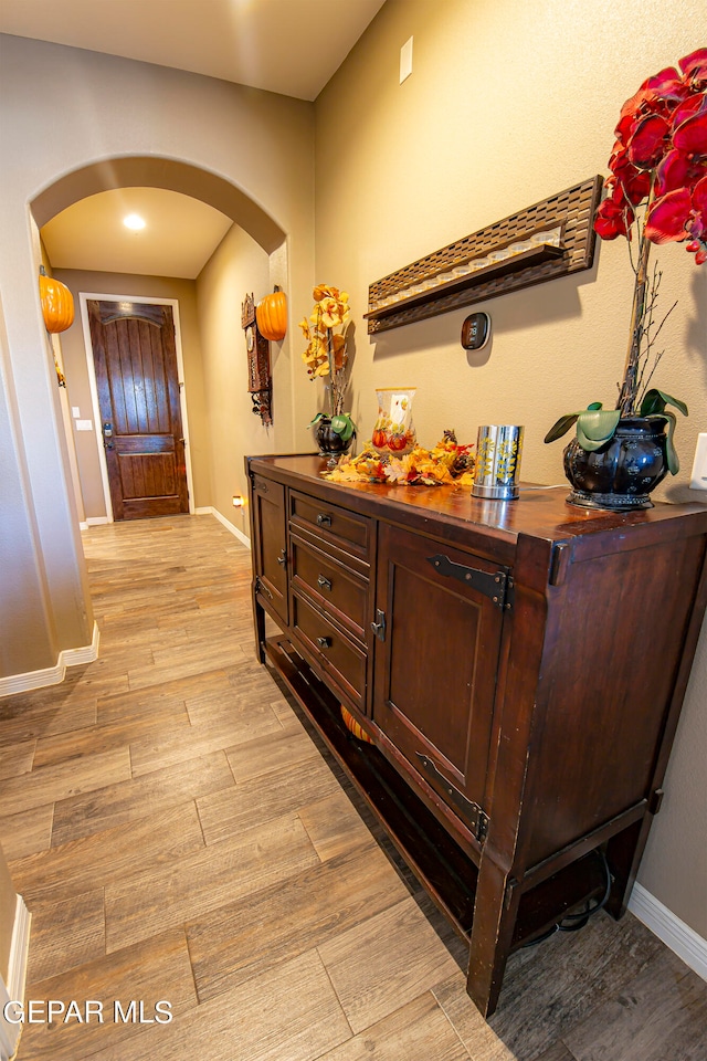 hallway featuring light hardwood / wood-style flooring