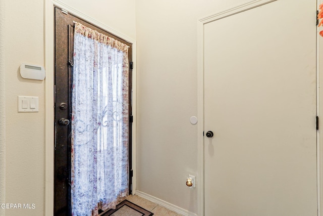 bathroom featuring tile patterned flooring