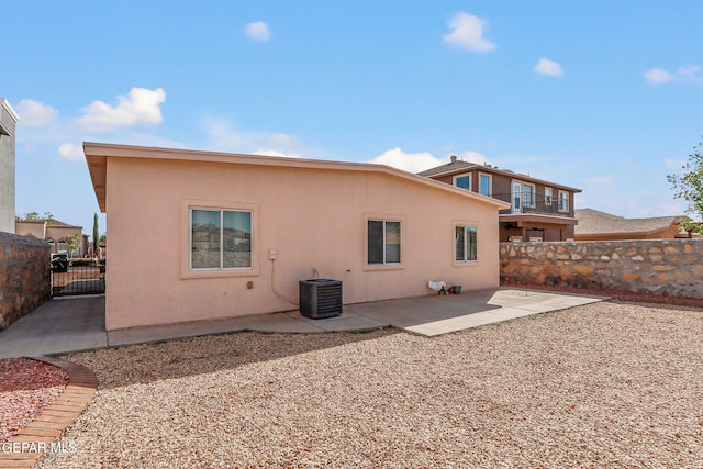 back of house featuring a patio and central AC unit