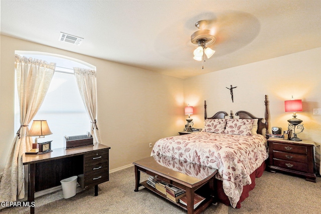 bedroom featuring ceiling fan and light colored carpet