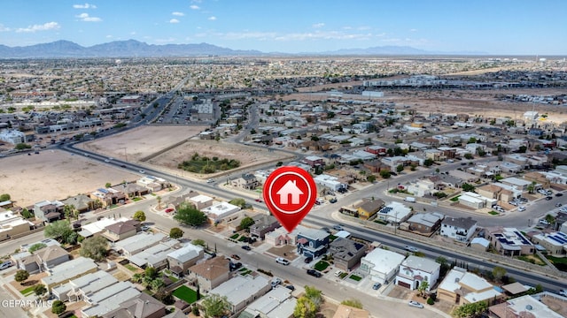 drone / aerial view featuring a mountain view