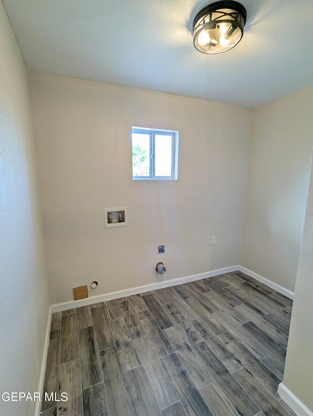 laundry area with washer hookup and wood-type flooring