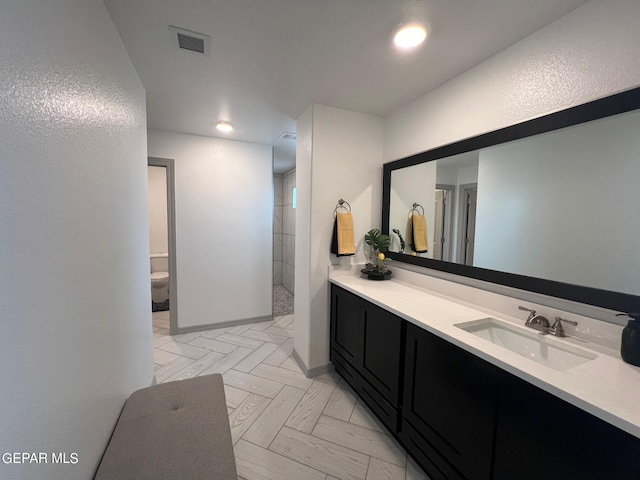 12832 Star Gaze Ave, El Paso, TX 79928 - full bathroom with vanity, toilet, walk in shower, and recessed lighting