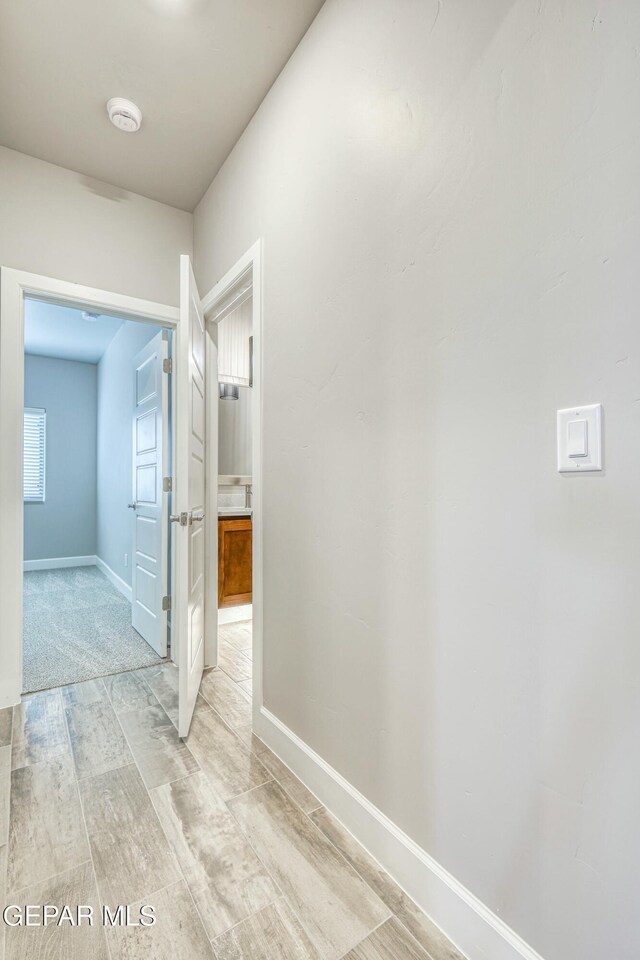 hall featuring light hardwood / wood-style floors