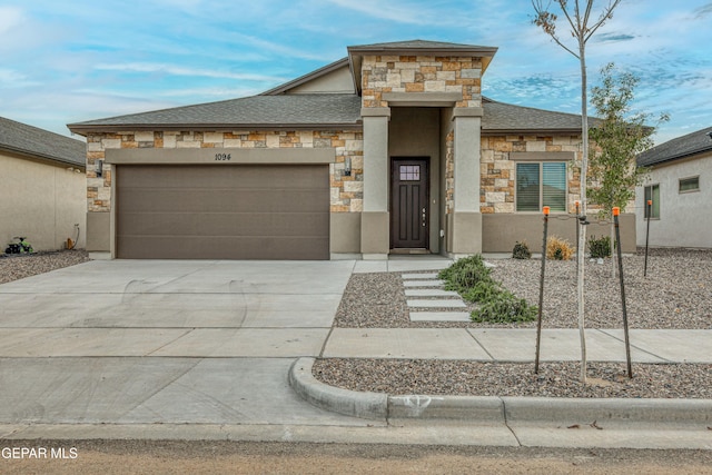 view of front of property with a garage