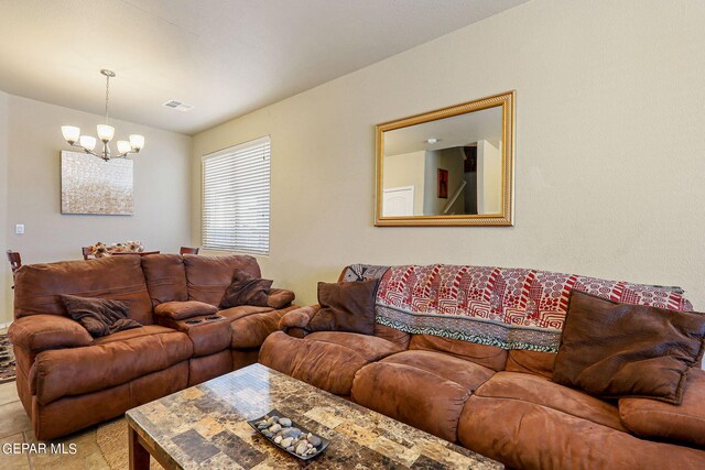 living room featuring an inviting chandelier