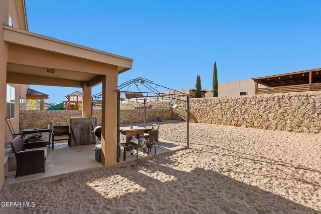 view of yard with a gazebo and a patio