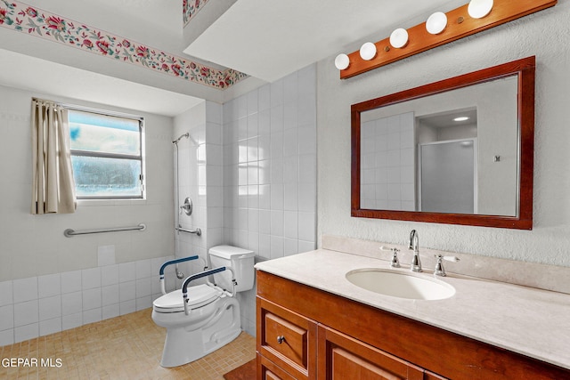 bathroom featuring tile walls, vanity, an enclosed shower, toilet, and tile patterned floors