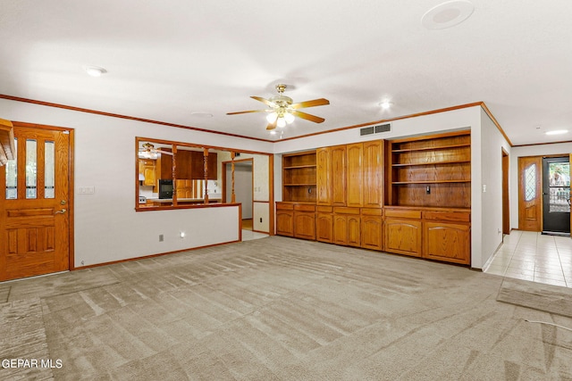 unfurnished living room with ceiling fan, light carpet, and ornamental molding