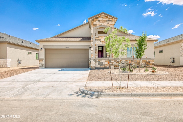 view of front of home with a garage and central AC