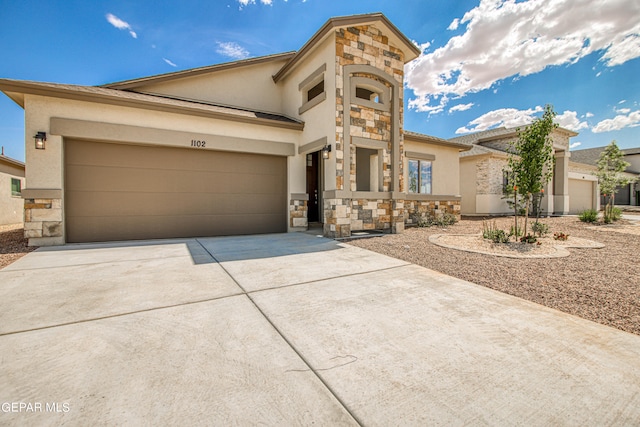 view of front of property with a garage