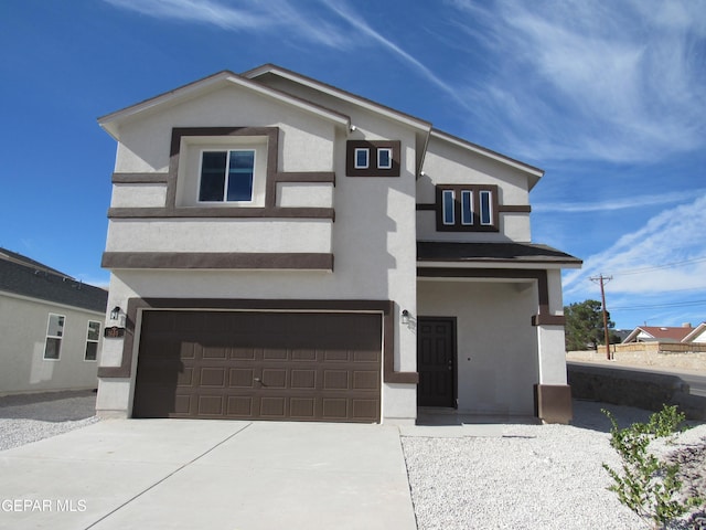 view of front of property featuring a garage