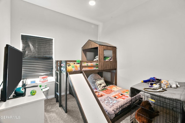 bedroom featuring light carpet