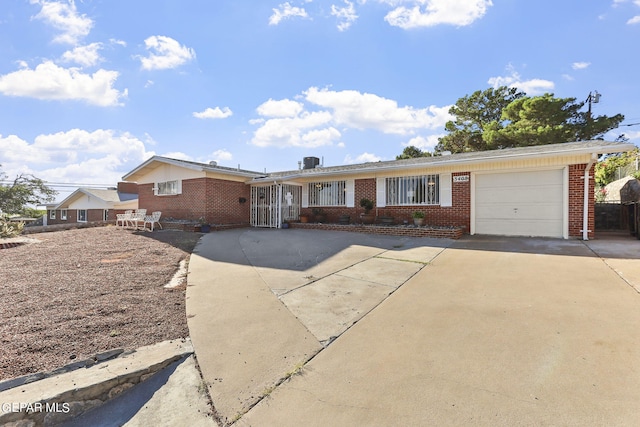 single story home with a garage