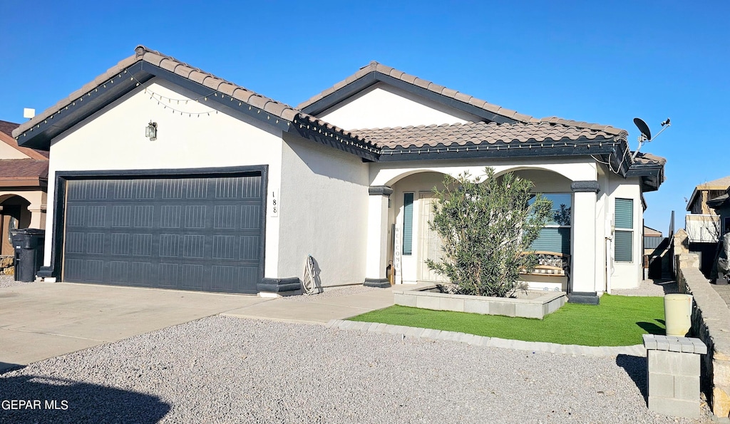 view of front of property featuring a garage