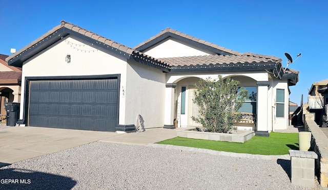 view of front of property featuring a garage