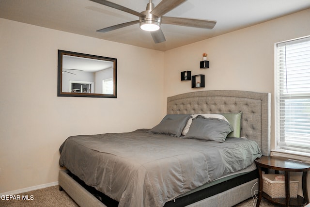 bedroom featuring ceiling fan and carpet floors