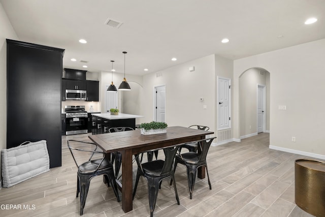 dining room featuring light wood-type flooring