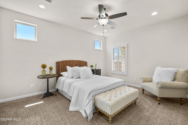 bedroom with ceiling fan and carpet