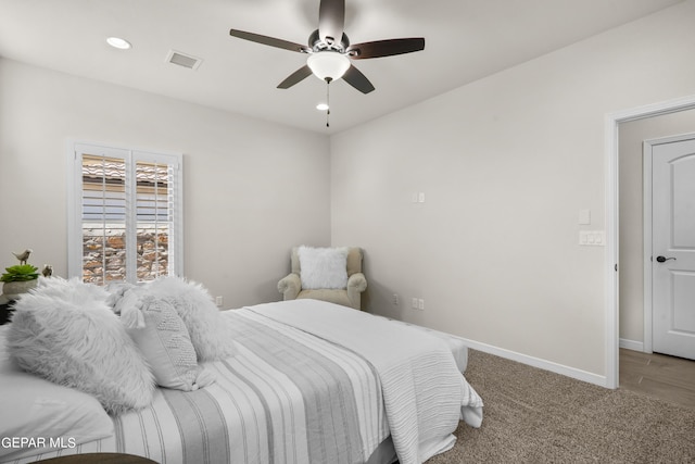 carpeted bedroom with ceiling fan