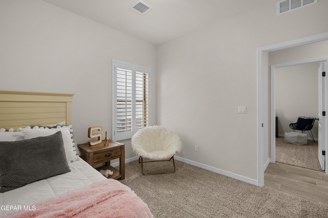 bedroom featuring light hardwood / wood-style flooring