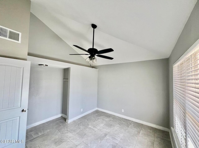 unfurnished bedroom with high vaulted ceiling, multiple windows, and ceiling fan