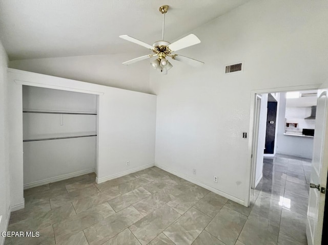 unfurnished room featuring high vaulted ceiling and ceiling fan