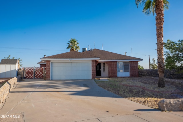 ranch-style house featuring a garage