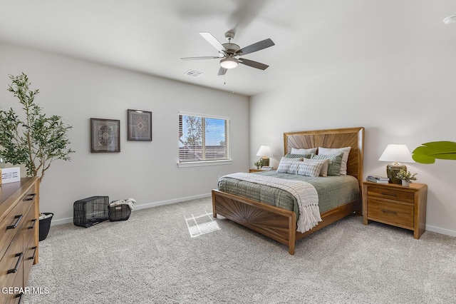 bedroom with a ceiling fan, visible vents, light carpet, and baseboards