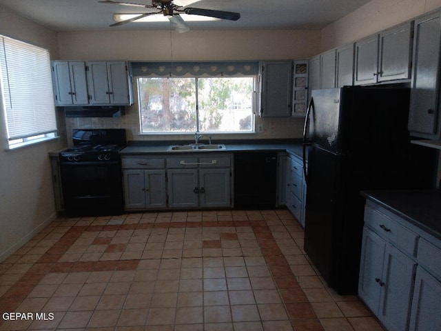 kitchen with sink, gray cabinets, and black appliances