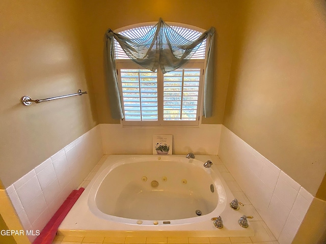 bathroom featuring tiled bath