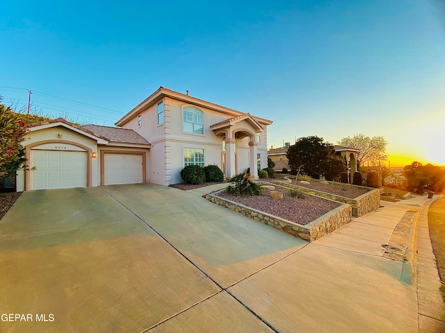 view of front of property with a garage